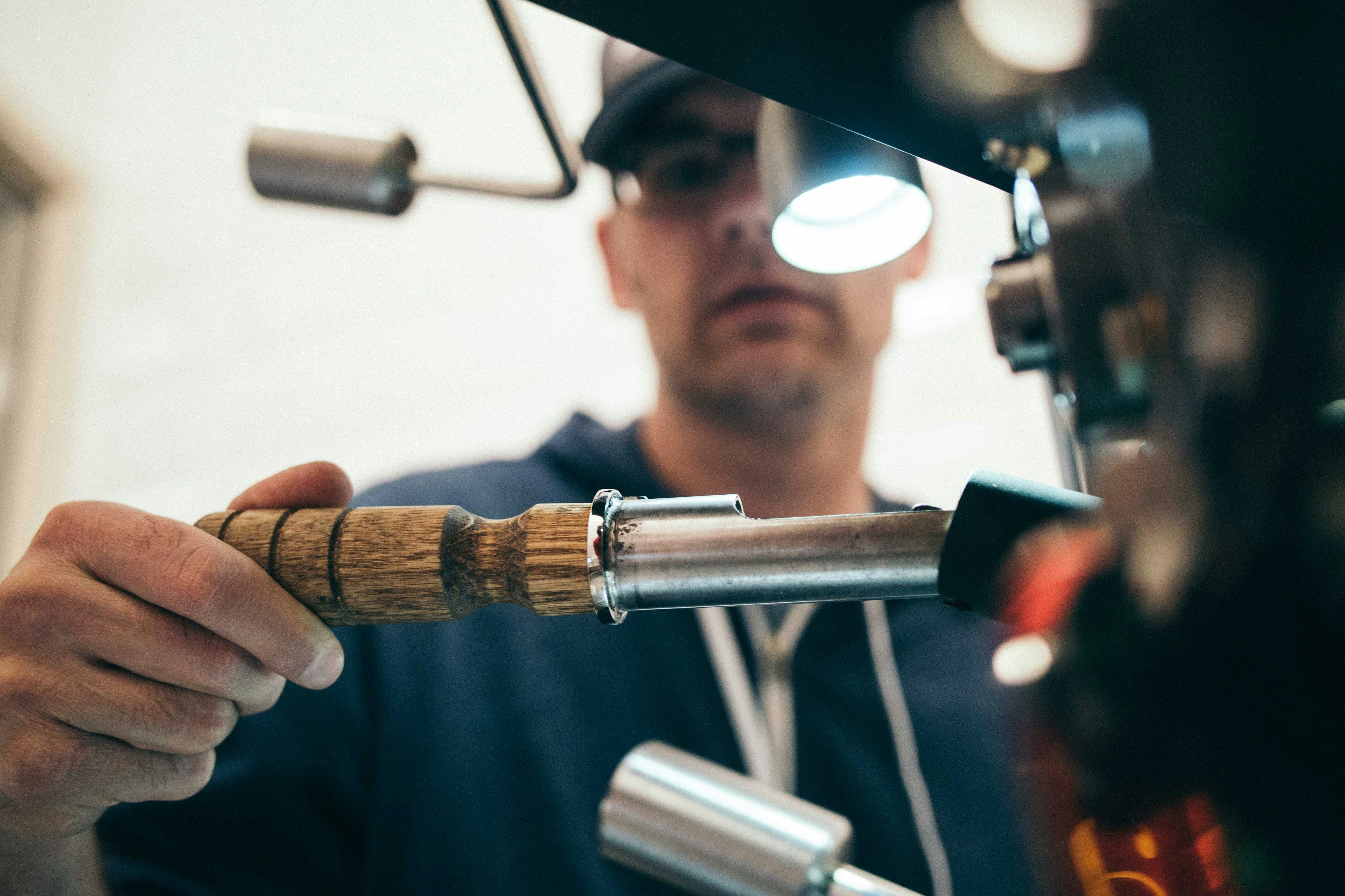 Technician fitting a pipe joint